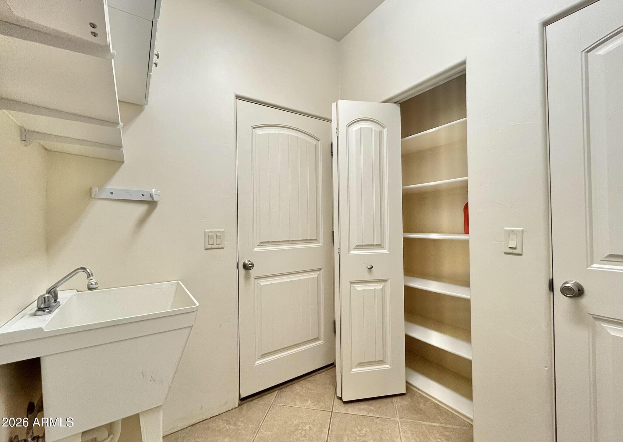 5655 North Laura Lane Rimrock, AZ 86335 - Photo 27 of 37 a bathroom with a sink and a mirror