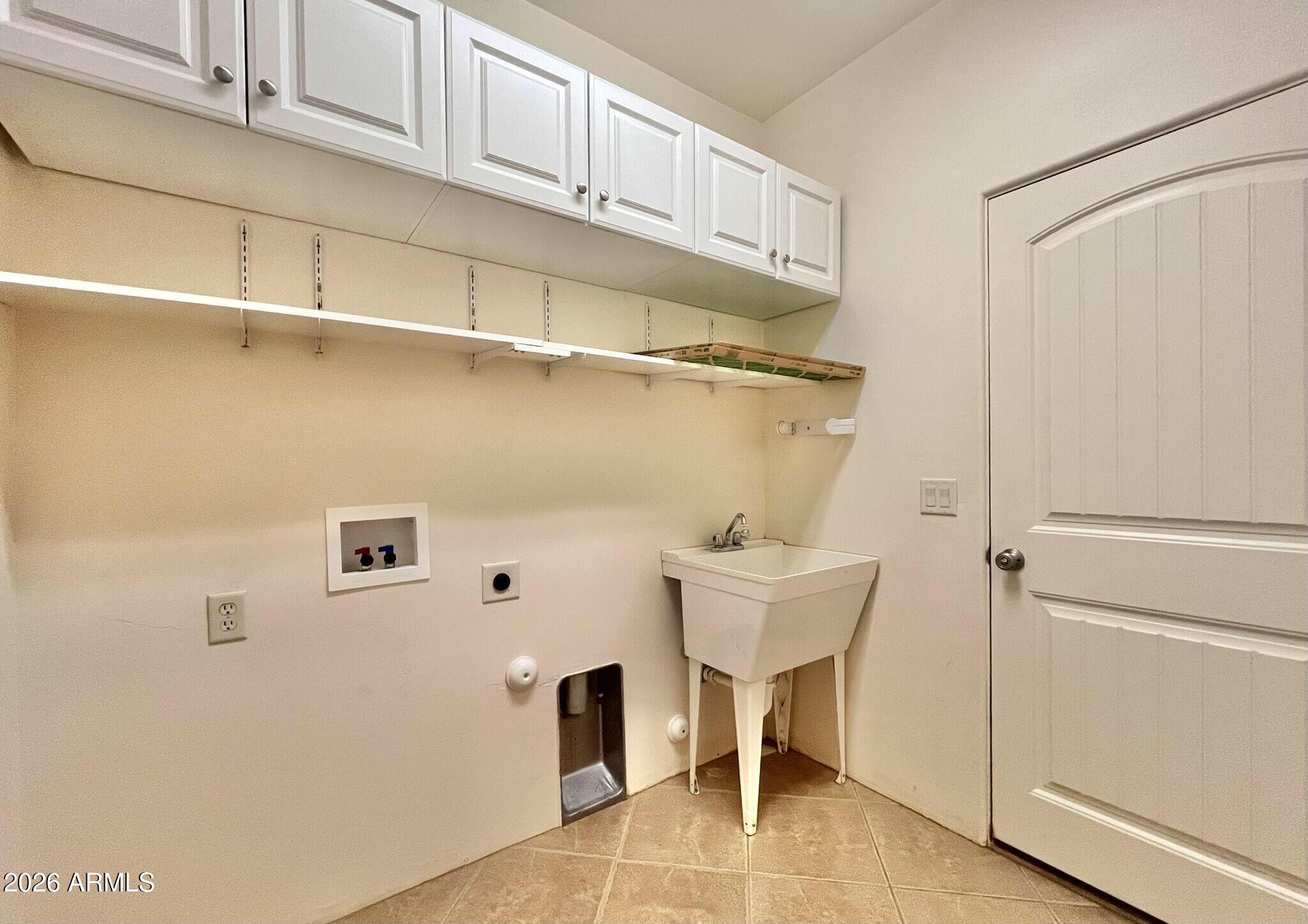 5655 North Laura Lane Rimrock, AZ 86335 - Photo 28 of 37 a view of a room with racks on the wall