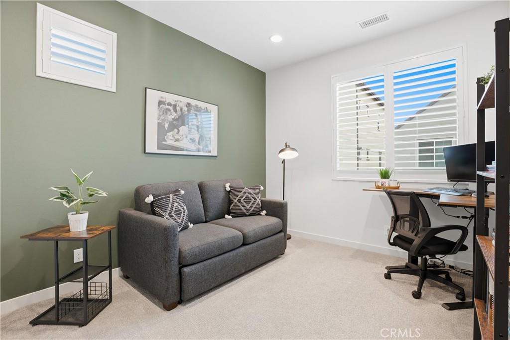 451 Potter Way Rancho Mission Viejo, CA 92694 - Photo 20 of 75 a living room with furniture and a window