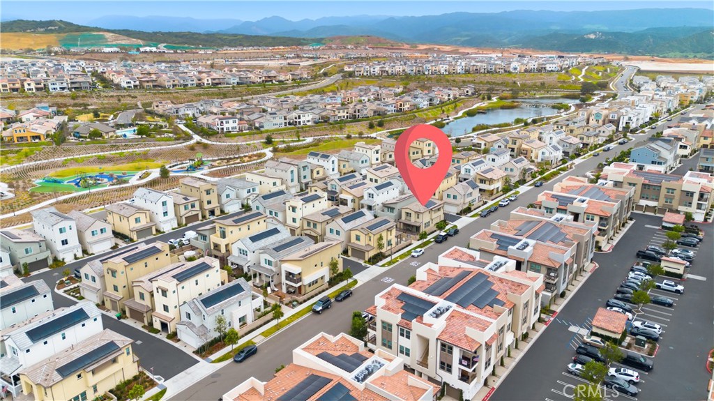 451 Potter Way Rancho Mission Viejo, CA 92694 - Photo 33 of 75 an aerial view of residential building and lake view