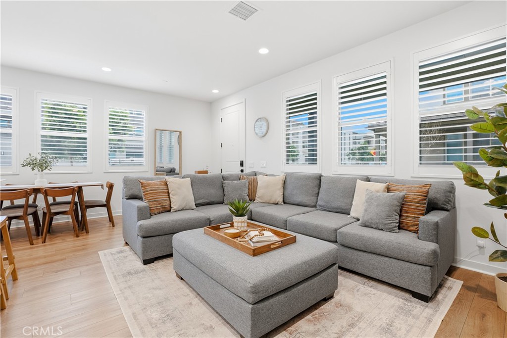 451 Potter Way Rancho Mission Viejo, CA 92694 - Photo 8 of 75 a living room with furniture and windows
