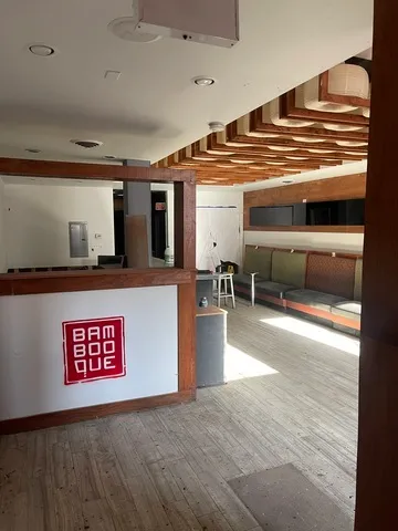 a view of kitchen with furniture and counter top