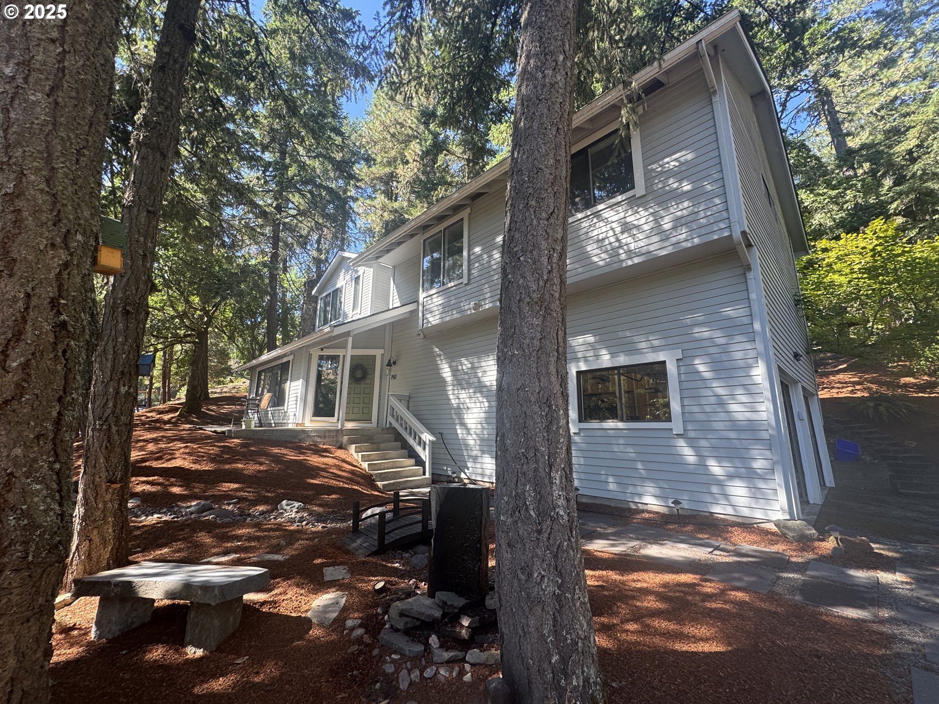 792 Brookside Drive Eugene, OR 97405 - Photo 2 of 46 a front view of a house with yard