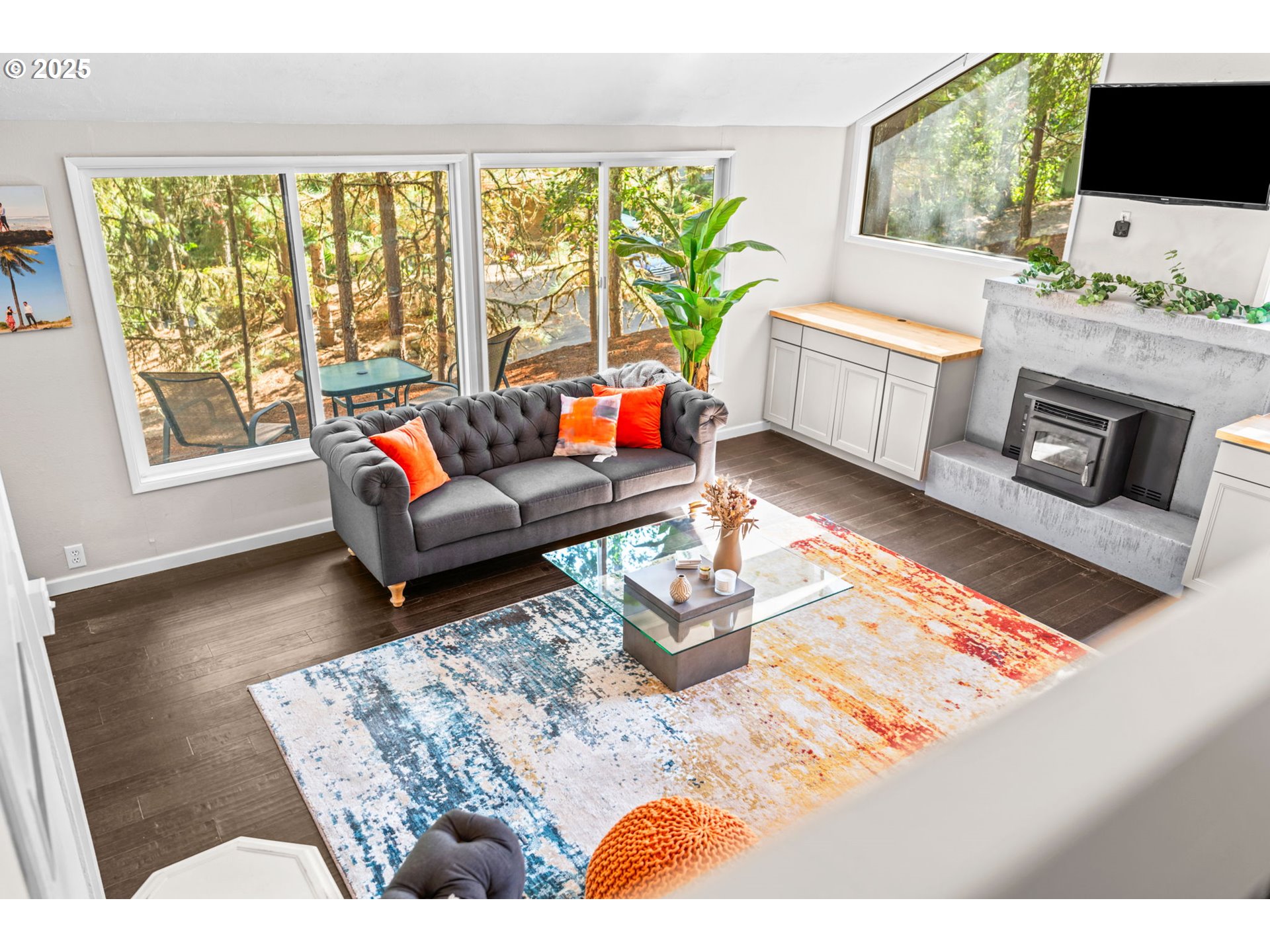 792 Brookside Drive Eugene, OR 97405 - Photo 22 of 46 a living room with furniture and a flat screen tv