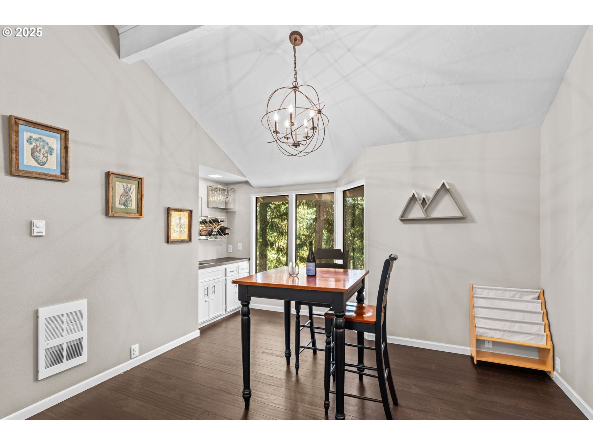 792 Brookside Drive Eugene, OR 97405 - Photo 24 of 46 a view of a dining room with furniture window and wooden floor