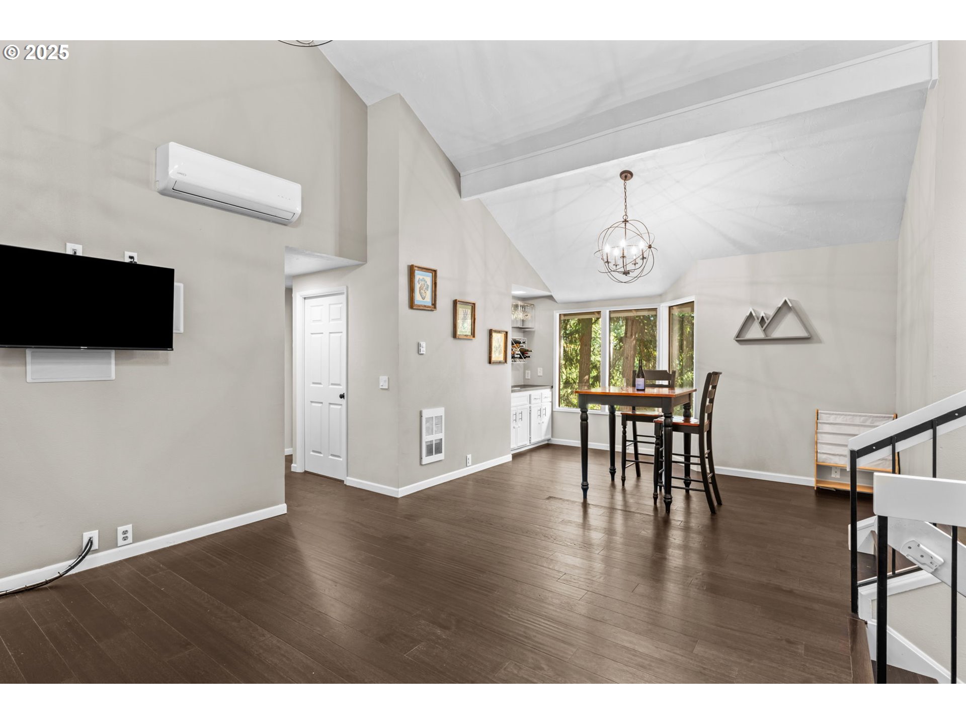792 Brookside Drive Eugene, OR 97405 - Photo 27 of 46 a view of a livingroom with furniture and a flat screen tv