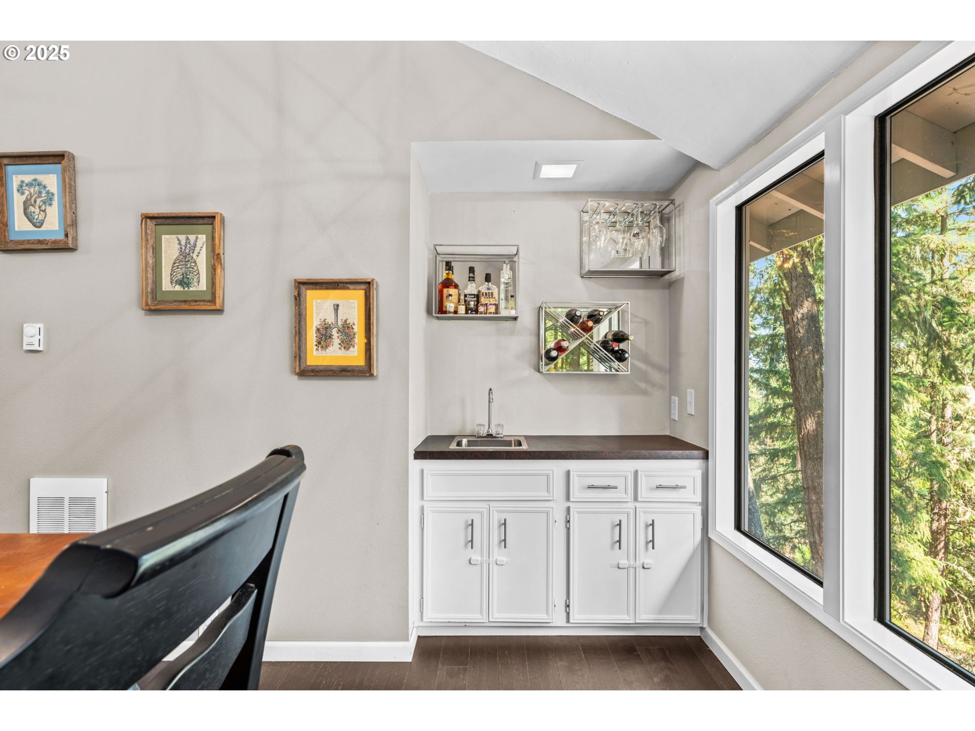 792 Brookside Drive Eugene, OR 97405 - Photo 28 of 46 a view of cabinets with wooden floor and furniture