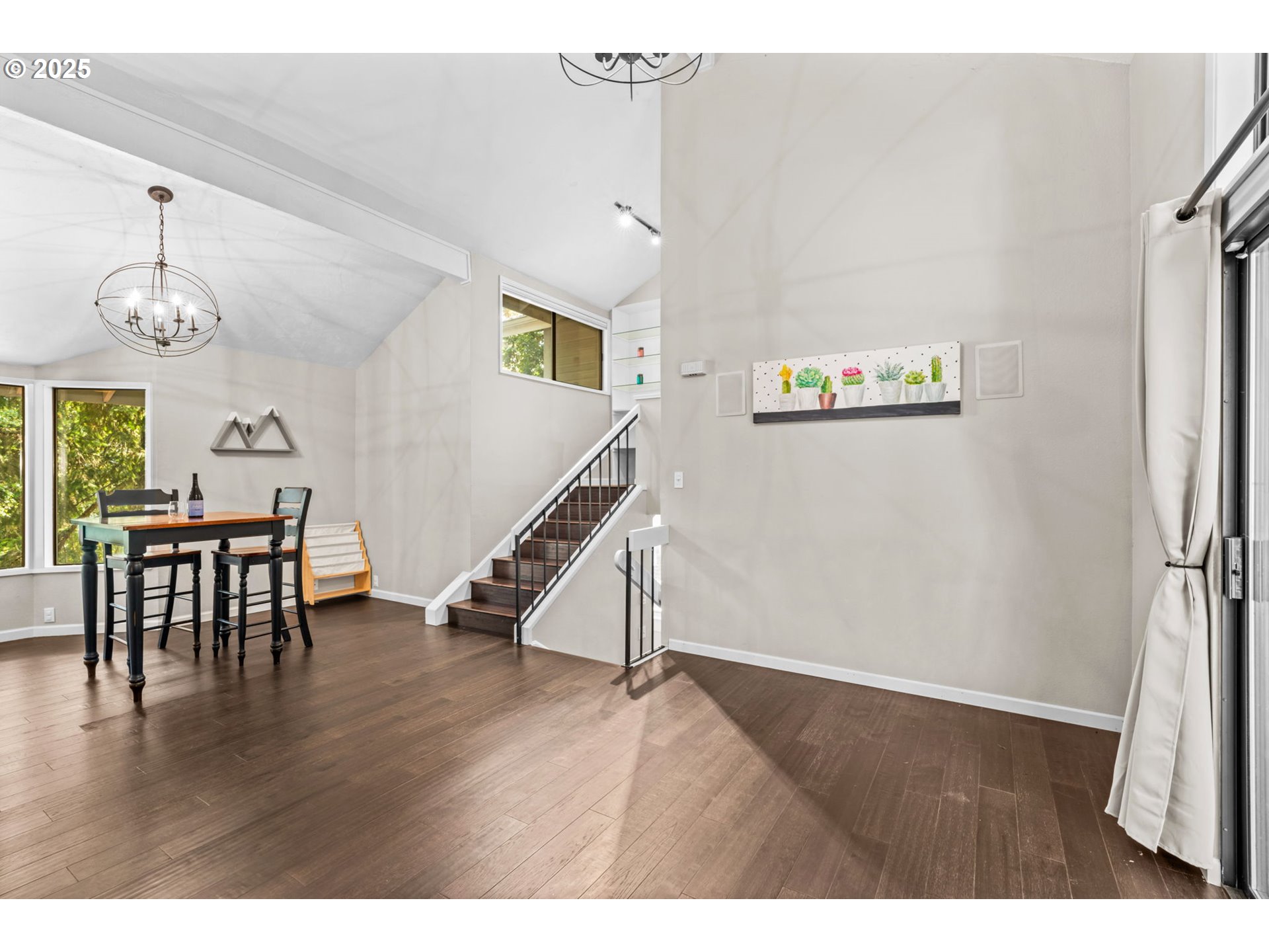 792 Brookside Drive Eugene, OR 97405 - Photo 29 of 46 a view of a dining room with furniture window and wooden floor