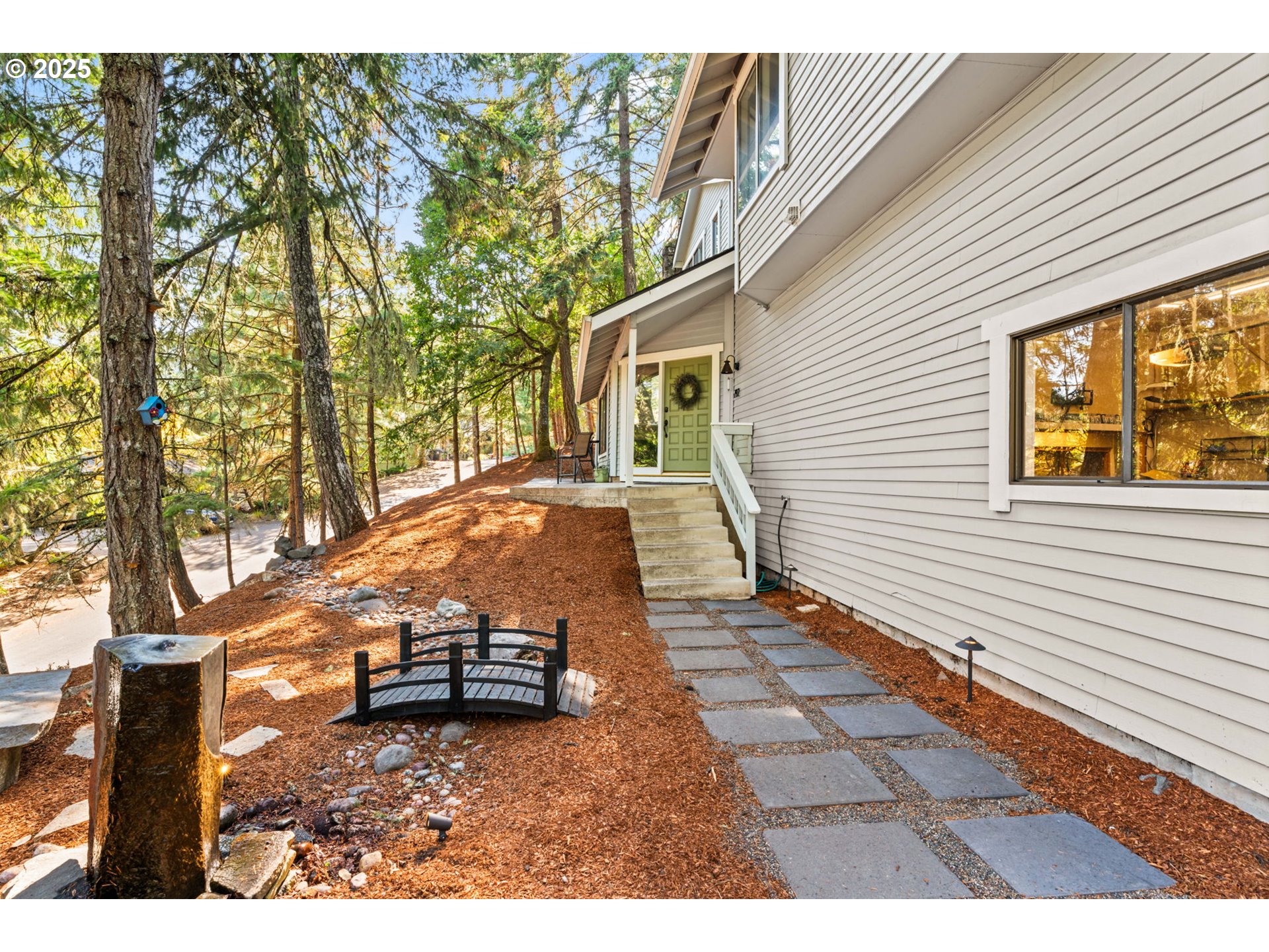 792 Brookside Drive Eugene, OR 97405 - Photo 3 of 46 a backyard of a house with barbeque oven