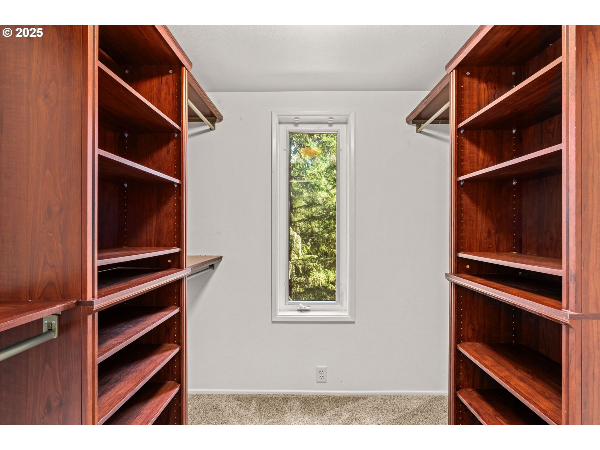 792 Brookside Drive Eugene, OR 97405 - Photo 42 of 46 a view of walk in closet with clothes and shoes