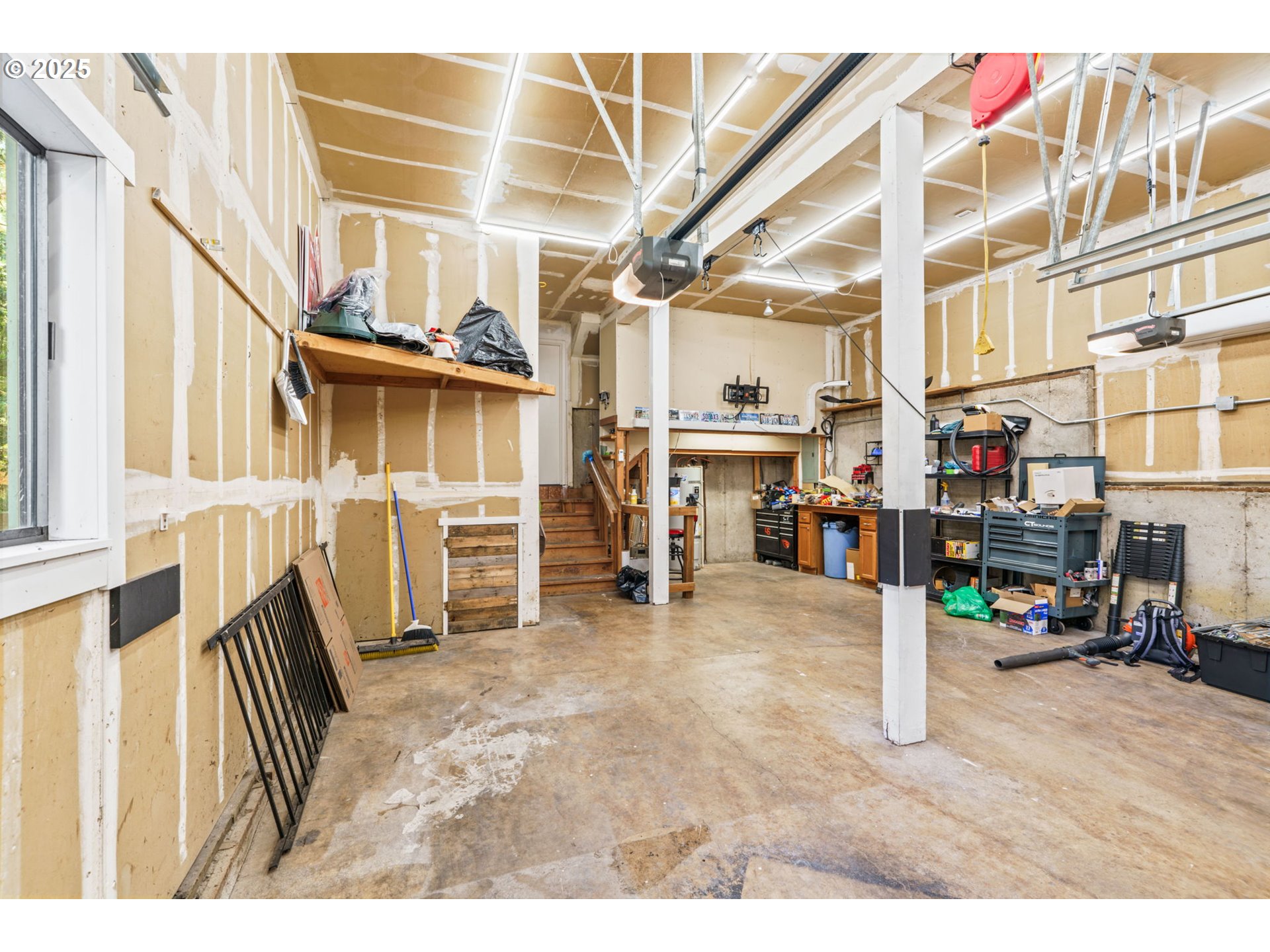 792 Brookside Drive Eugene, OR 97405 - Photo 44 of 46 a view of living room with furniture and a flat screen tv
