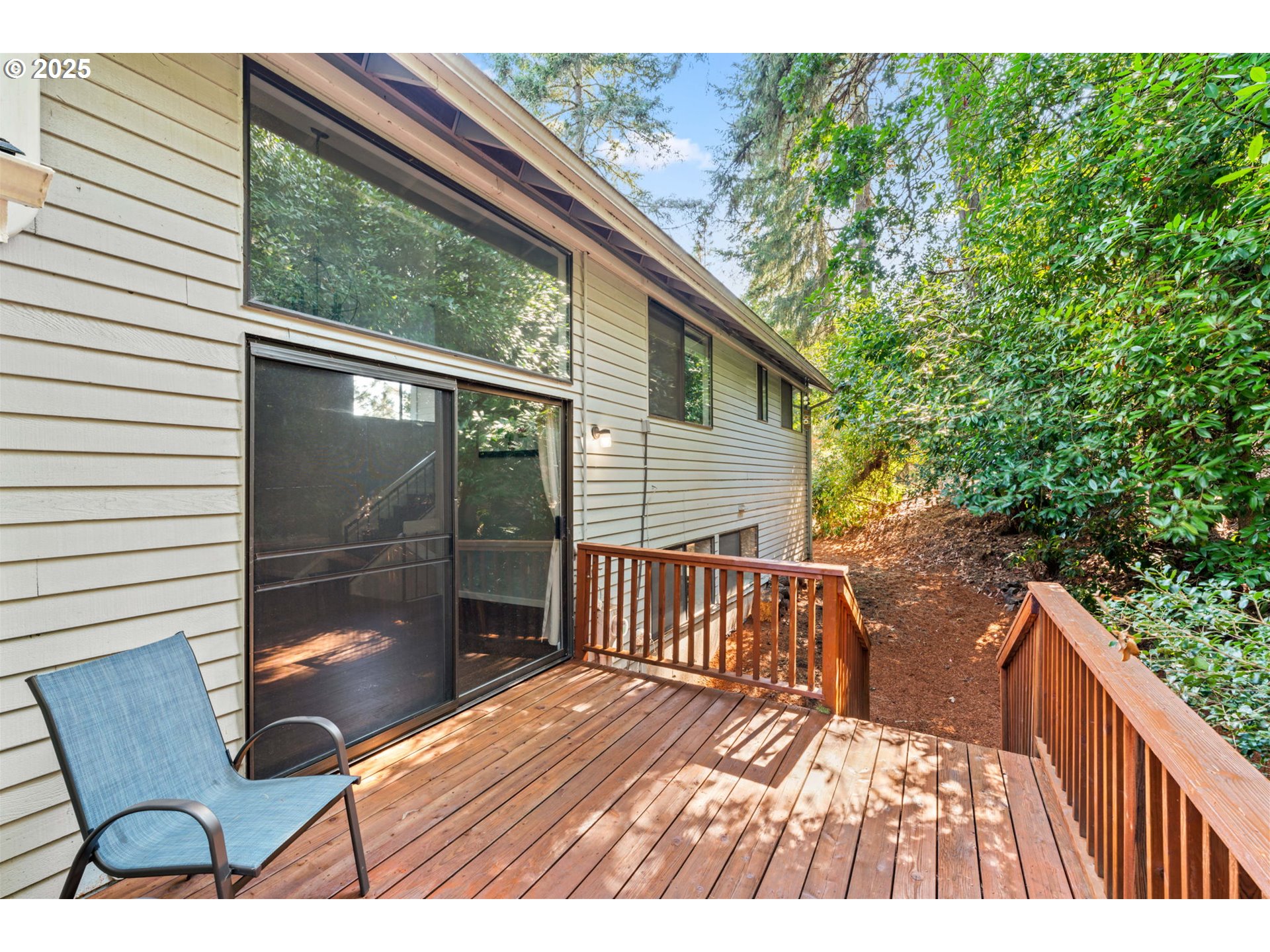 792 Brookside Drive Eugene, OR 97405 - Photo 45 of 46 a view of balcony with two chairs and wooden fence