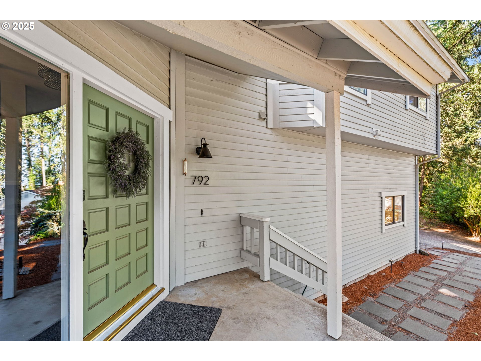 792 Brookside Drive Eugene, OR 97405 - Photo 9 of 46 a view of a porch with wooden floor and a yard