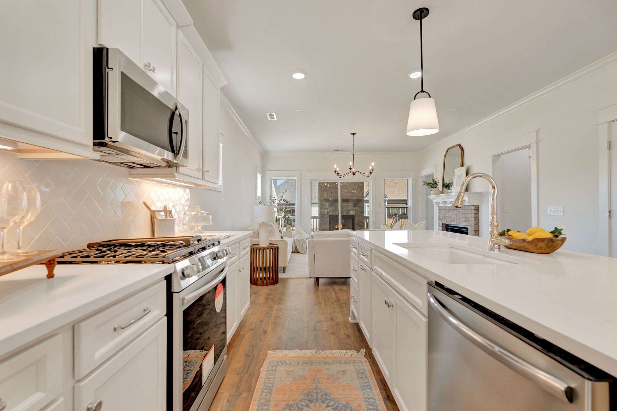 50 Pontoon Place Winchester, TN 37398 - Photo 15 of 57 a kitchen with stainless steel appliances granite countertop a sink a stove and a wooden floors