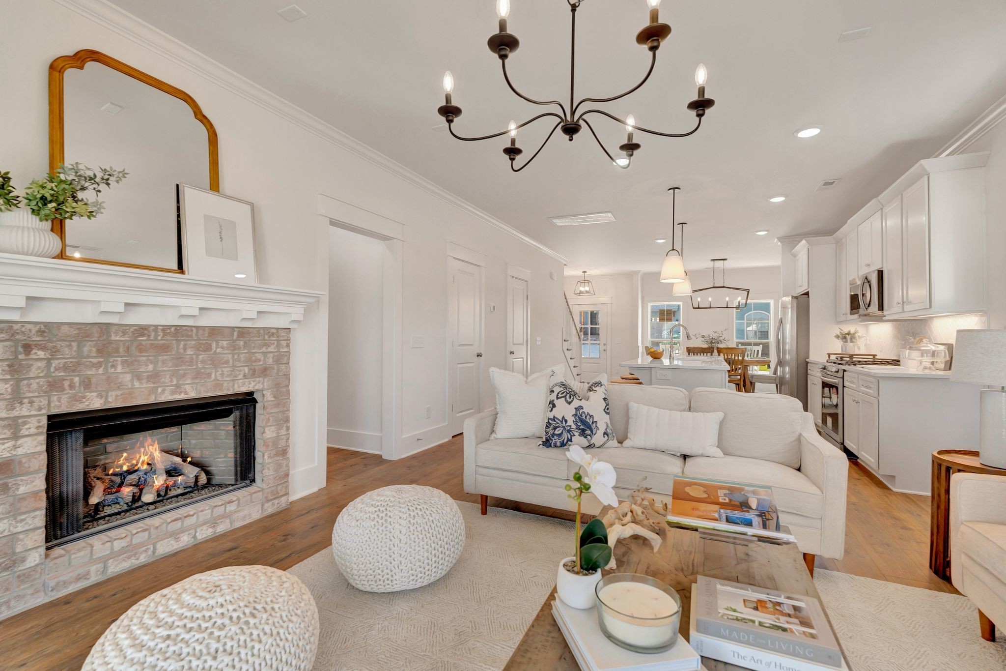 50 Pontoon Place Winchester, TN 37398 - Photo 19 of 57 a living room with furniture a fireplace and a chandelier