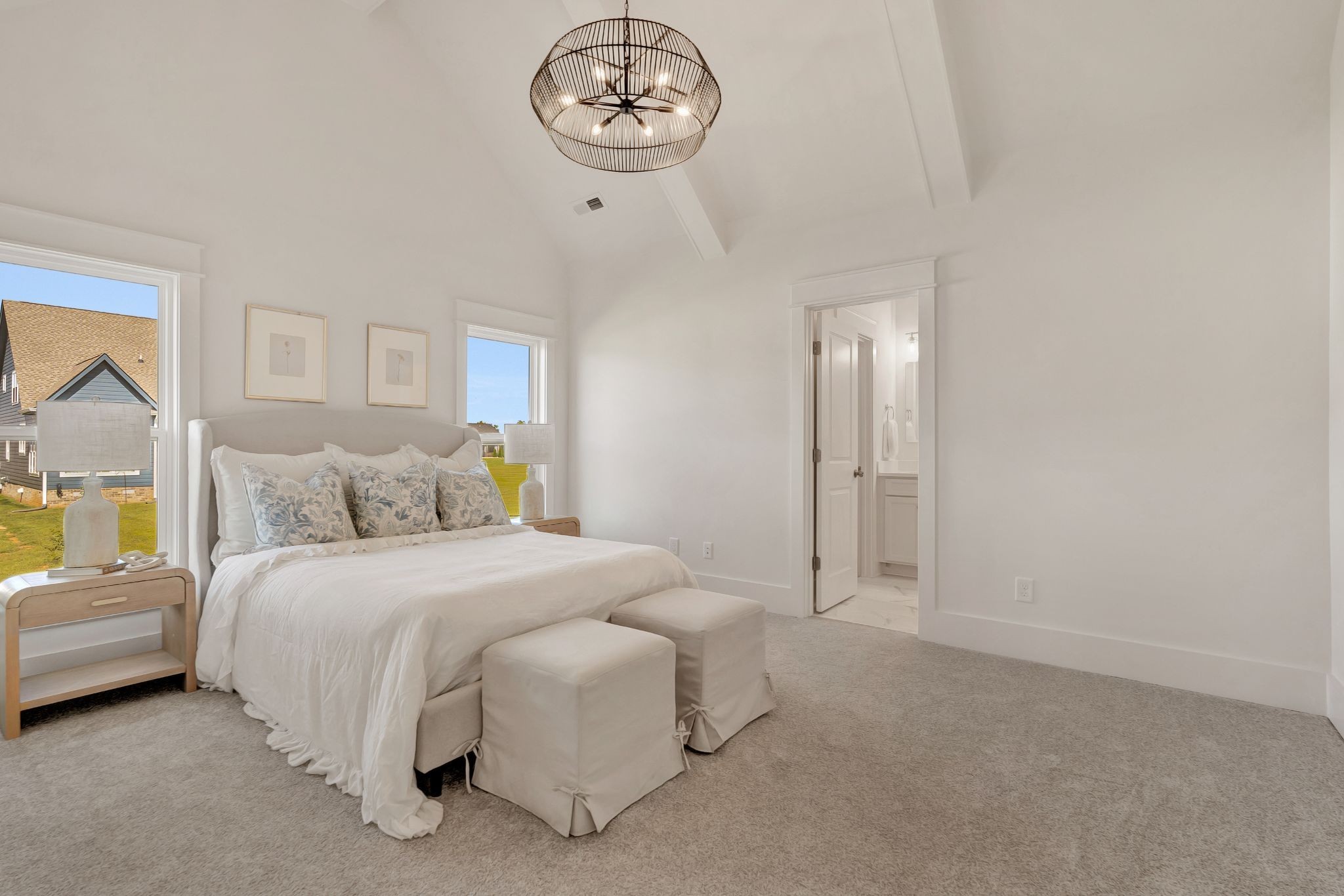 50 Pontoon Place Winchester, TN 37398 - Photo 20 of 57 a spacious bedroom with a bed and a chandelier