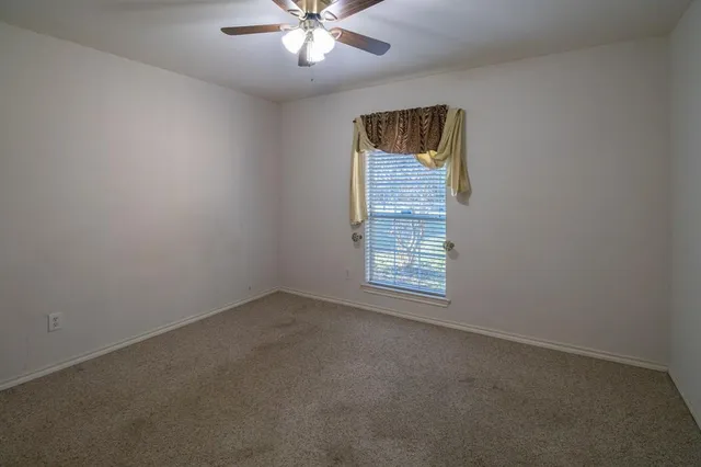 a view of swimming pool with seating area
