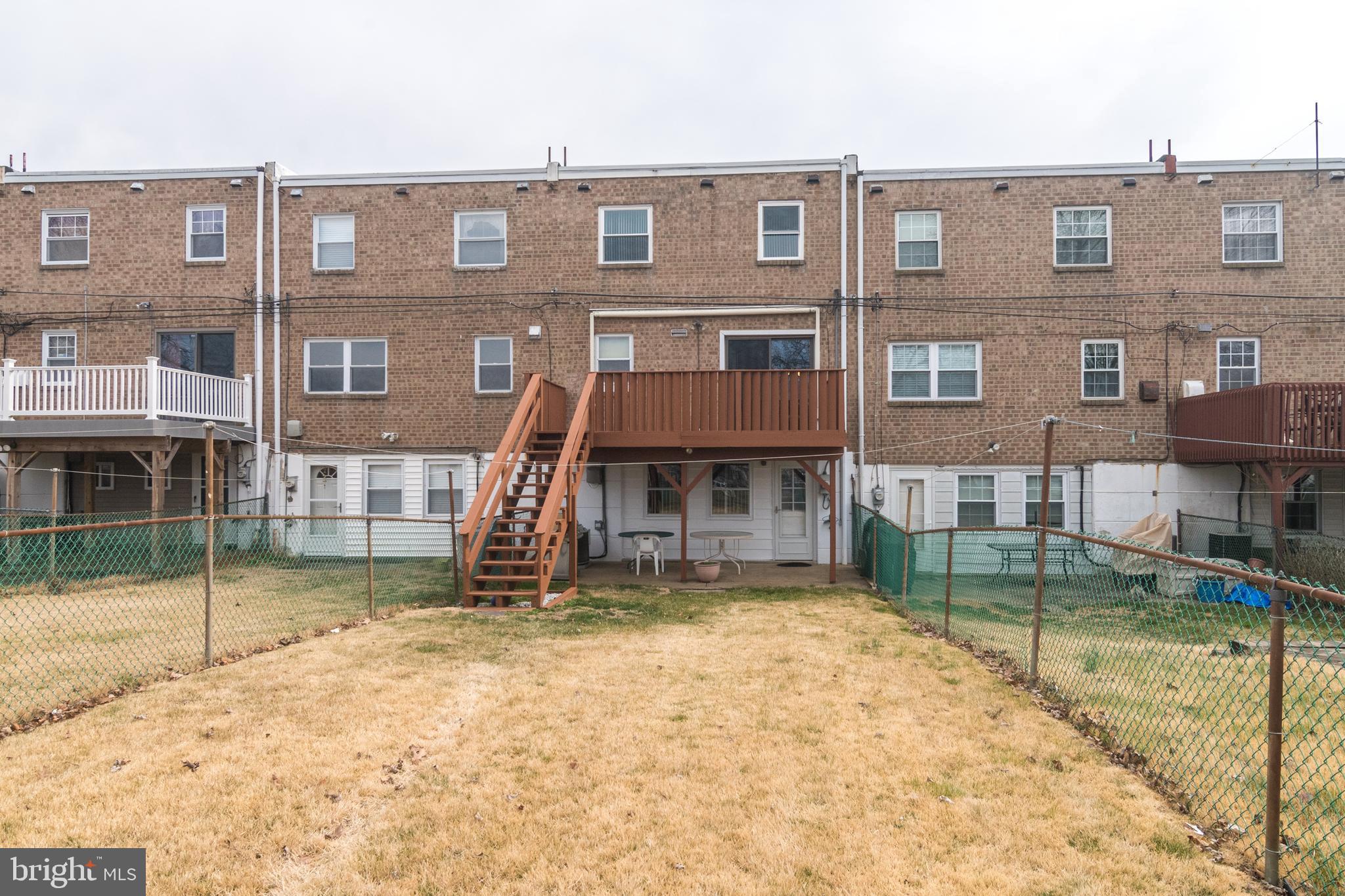 10224 West Keswick Road Philadelphia, PA 19114 - Photo 22 of 27 Fenced in Back Yard and Wood Deck