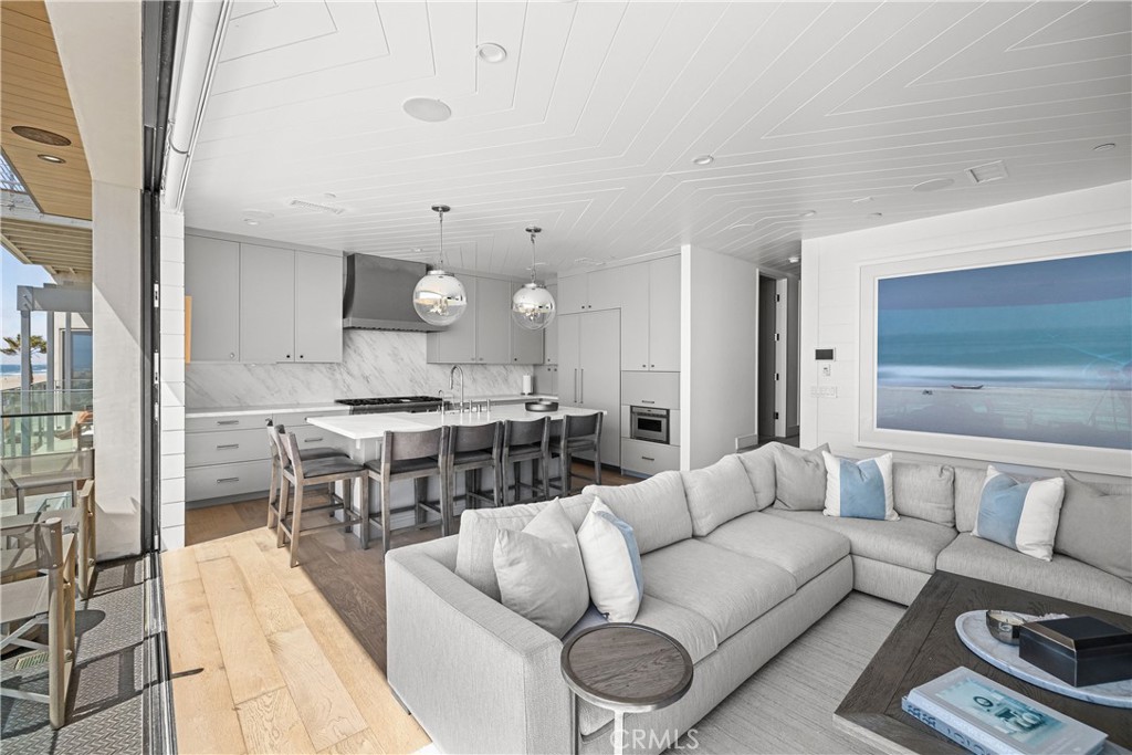 2200 The Strand, Unit B Manhattan Beach, CA 90266 - Photo 11 of 35 a living room with furniture kitchen and a table