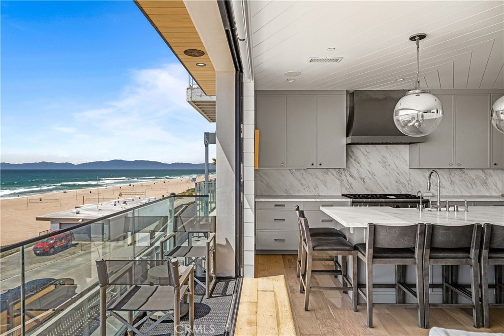 2200 The Strand, Unit B Manhattan Beach, CA 90266 - Photo 10 of 35 a view of a dining room with furniture and wooden floor