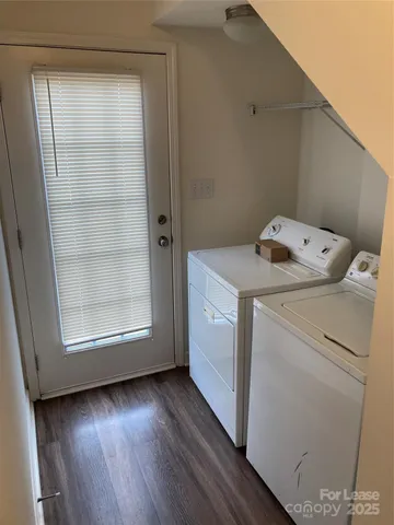 a view of bedroom and hallway