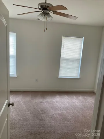a bathroom with a sink toilet and mirror