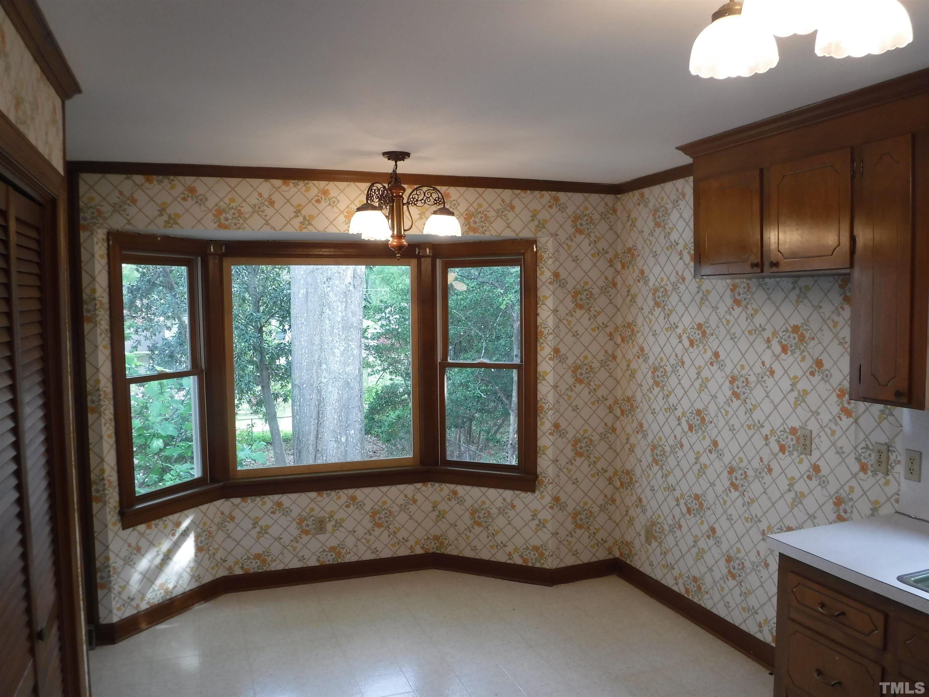 1008 Deerfield Road Raleigh, NC 27609 - Photo 15 of 18 a view of an empty room with a window