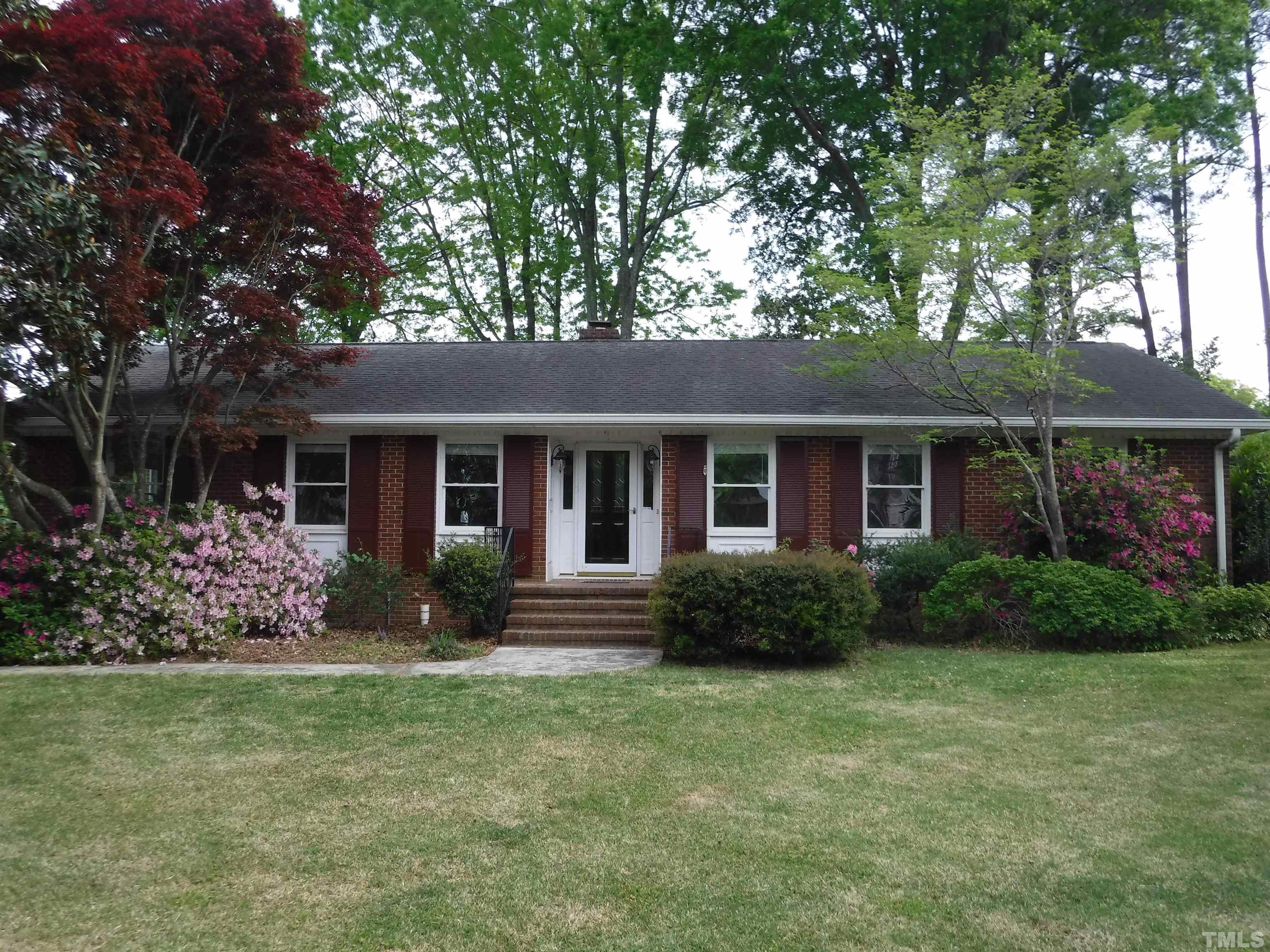 1008 Deerfield Road Raleigh, NC 27609 - Photo 3 of 18 front view of a house with a yard