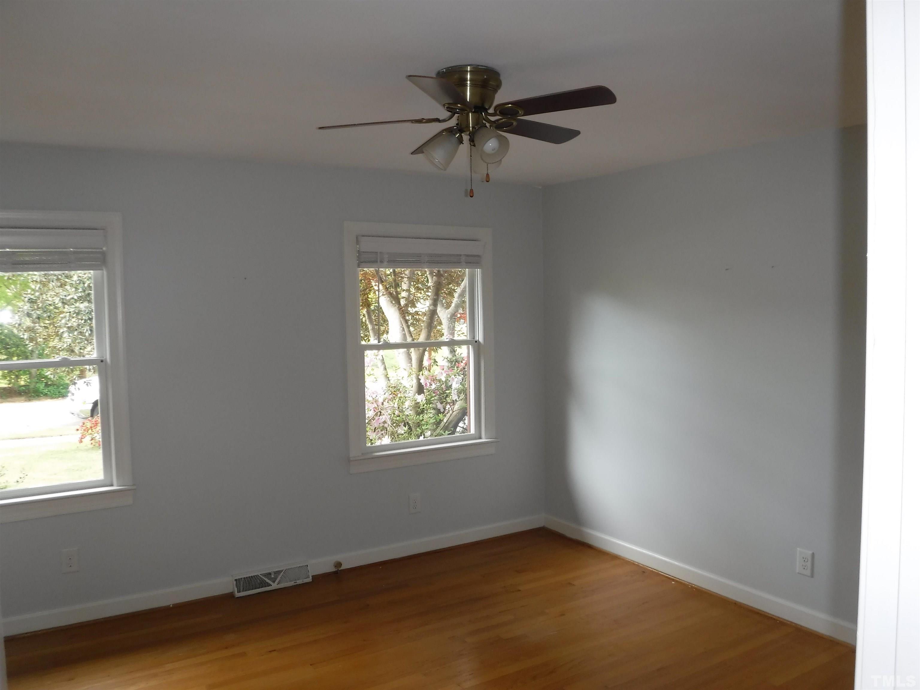 1008 Deerfield Road Raleigh, NC 27609 - Photo 8 of 18 an empty room with a window