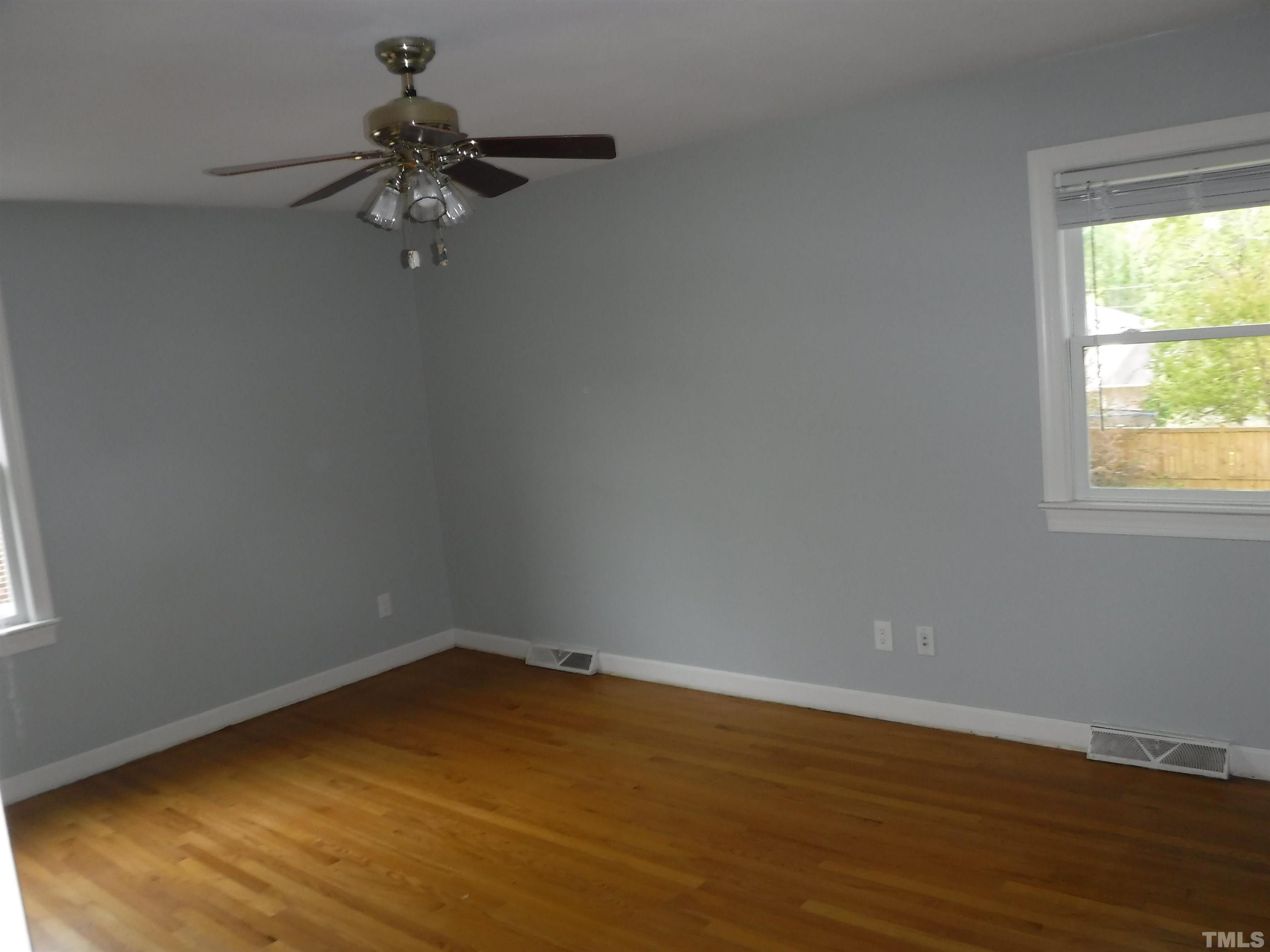 1008 Deerfield Road Raleigh, NC 27609 - Photo 10 of 18 an empty room with a window