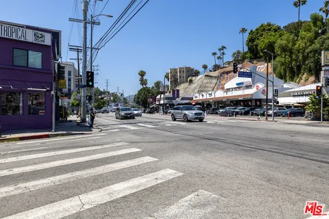 a view of a building with a street
