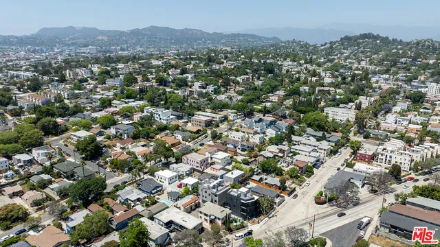 an aerial view of a city with lots of residential buildings