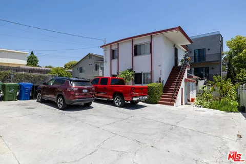 a view of a car in front of house