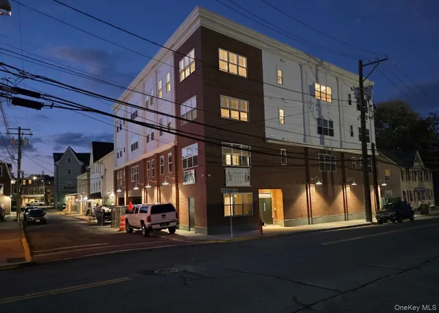 a view of a building with a street