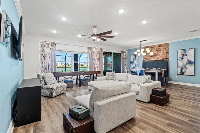 a bed sitting in a bedroom and table