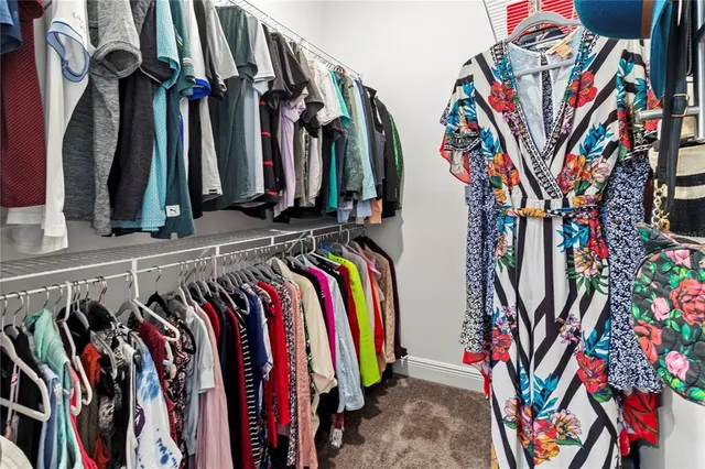 aerial view of a house with a yard