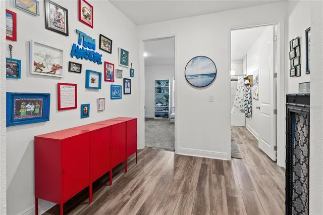 a view of a garden with a bench under an umbrella