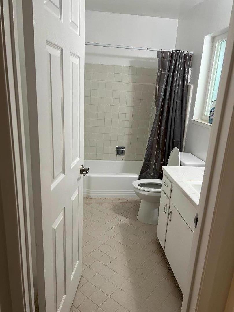 431 East St John Street San Jose, CA 95112 - Photo 24 of 32 a bathroom with a sink a toilet and a shower