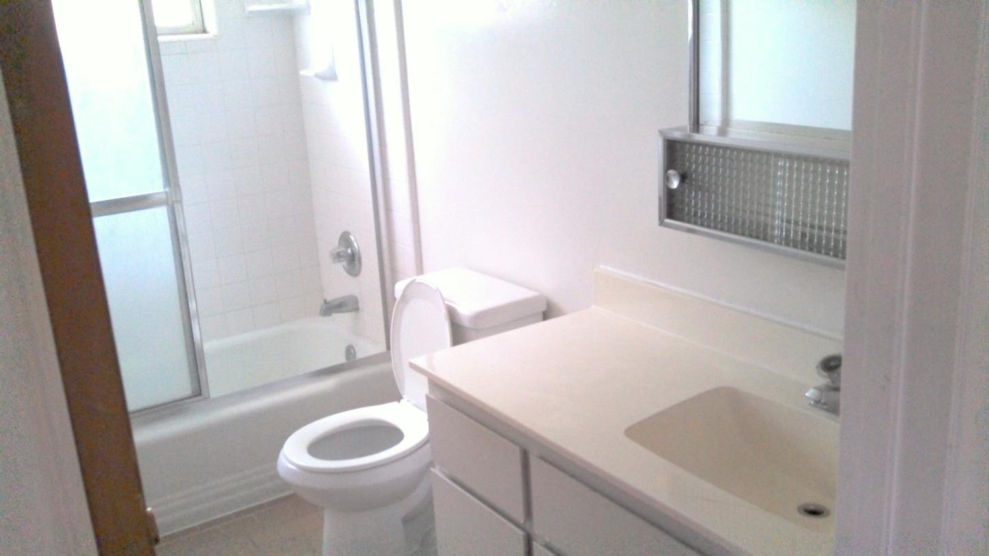 431 East St John Street San Jose, CA 95112 - Photo 26 of 32 a bathroom with a sink toilet and shower