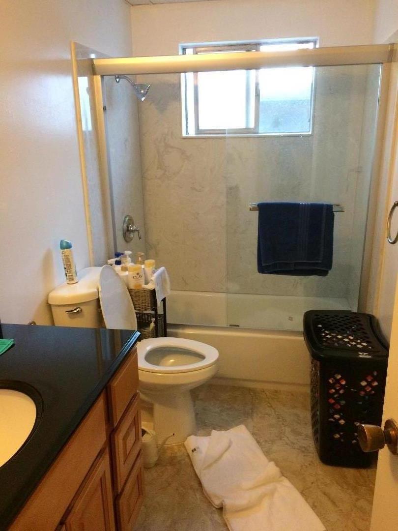 431 East St John Street San Jose, CA 95112 - Photo 30 of 32 a bathroom with a sink a toilet and a mirror