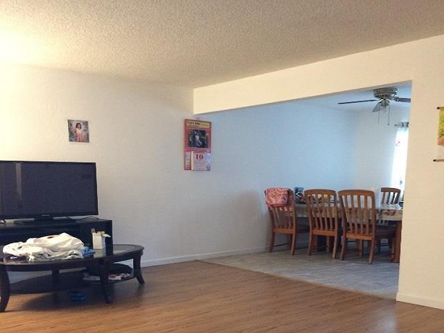 431 East St John Street San Jose, CA 95112 - Photo 8 of 32 a living room with furniture and a wooden floor