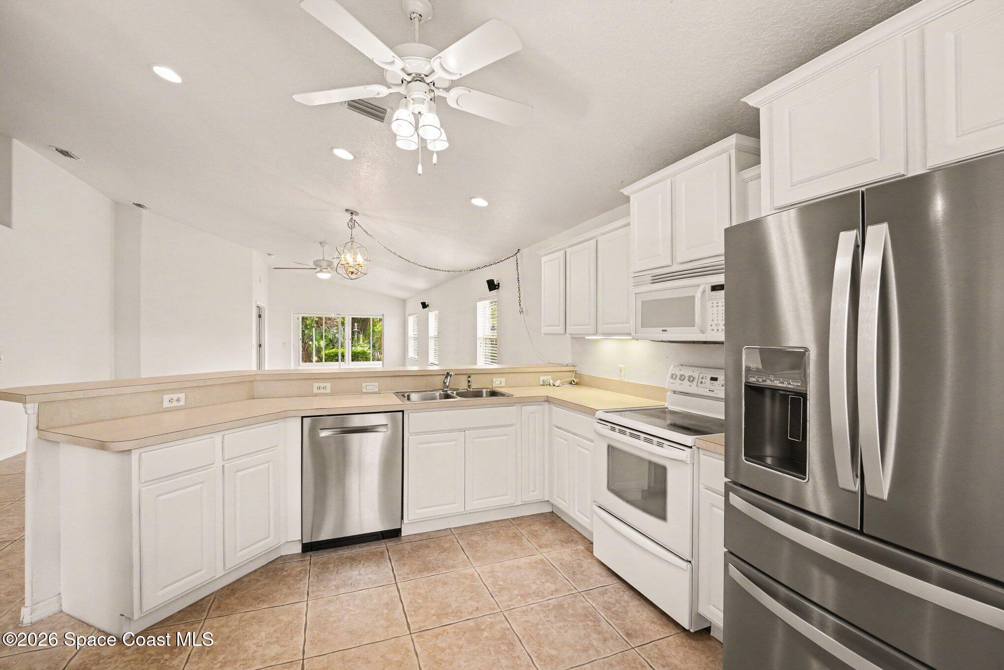 2194 Spring Creek Circle Palm Bay, FL 32905 - Photo 7 of 40 Spacious Kitchen
