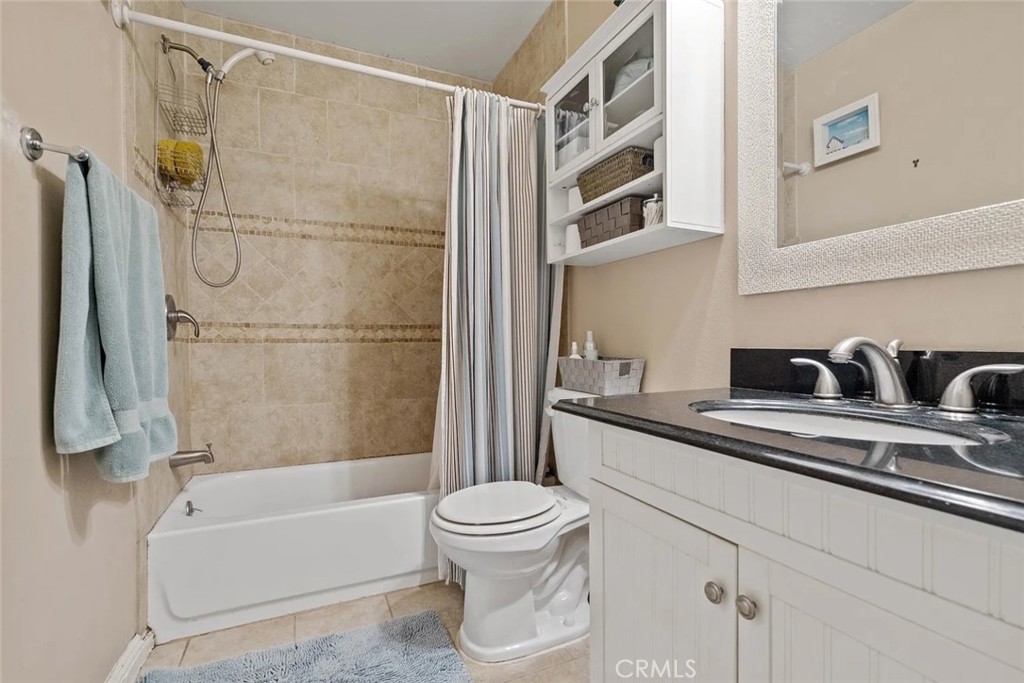 14022 Arlee Place Sylmar, CA 91342 - Photo 22 of 33 a bathroom with a sink a toilet and a bathtub