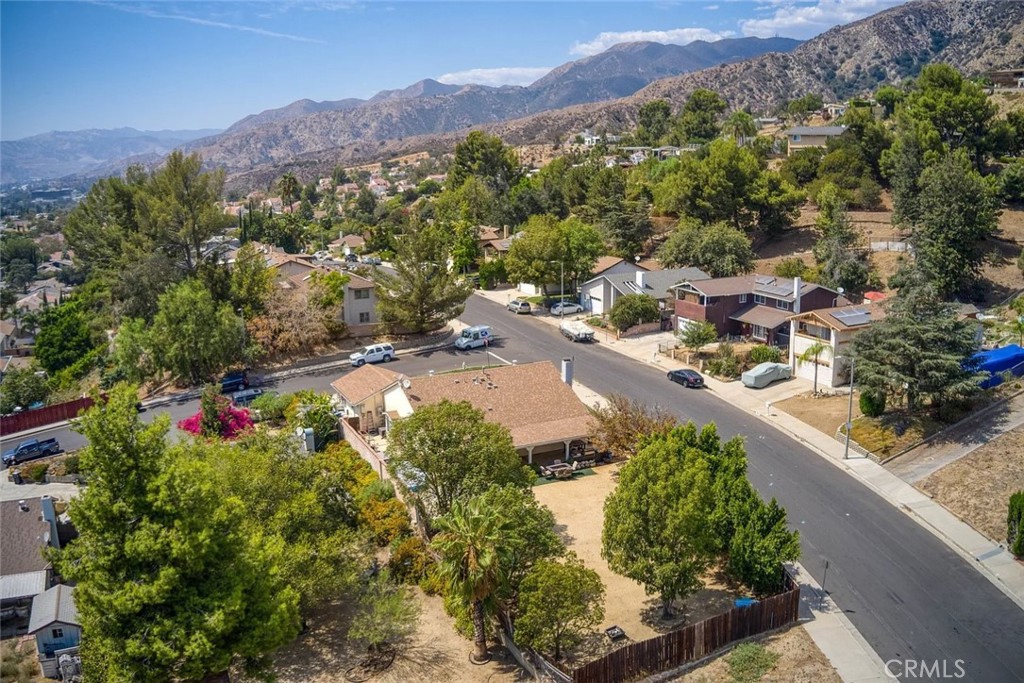 14022 Arlee Place Sylmar, CA 91342 - Photo 32 of 33 a view of a city with a mountain