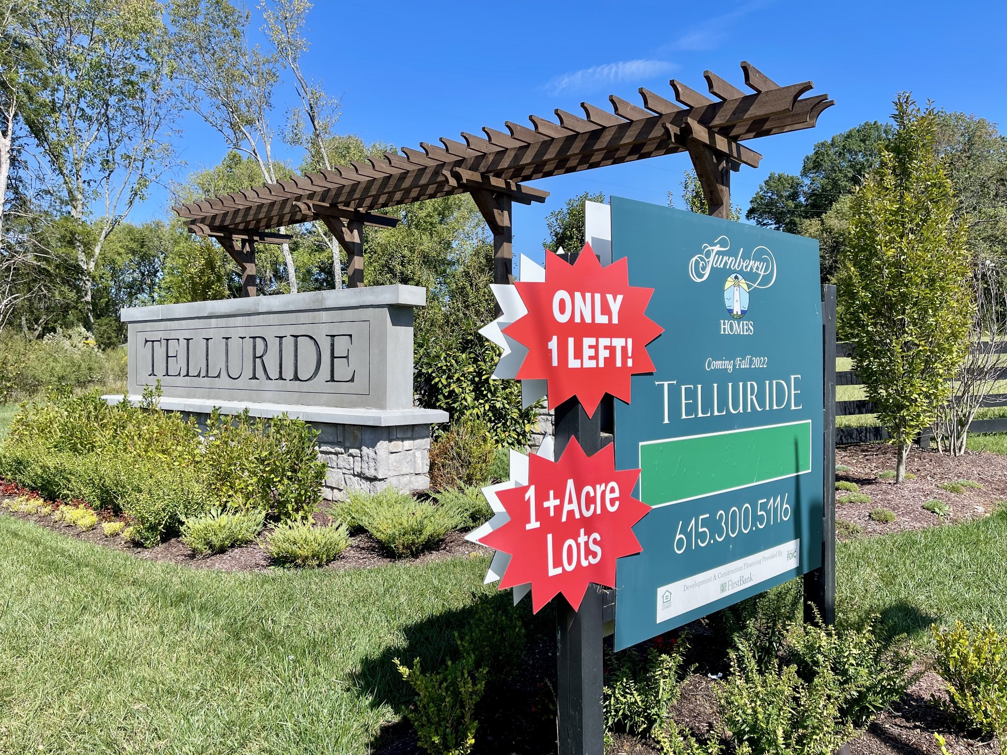 9919 Elland Road Brentwood, TN 37027 - Photo 2 of 2 a sign that is in front of flowers