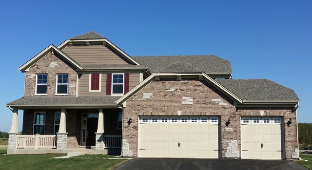 2056 Stapleton Road New Lenox, IL 60451 - Photo 1 of 25 a front view of a house with a yard