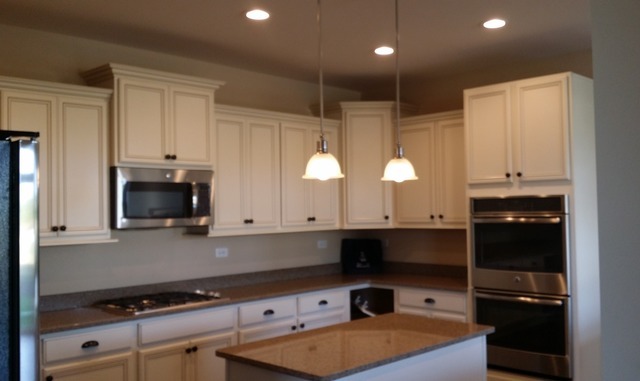 2056 Stapleton Road New Lenox, IL 60451 - Photo 13 of 25 a kitchen with a sink and cabinets