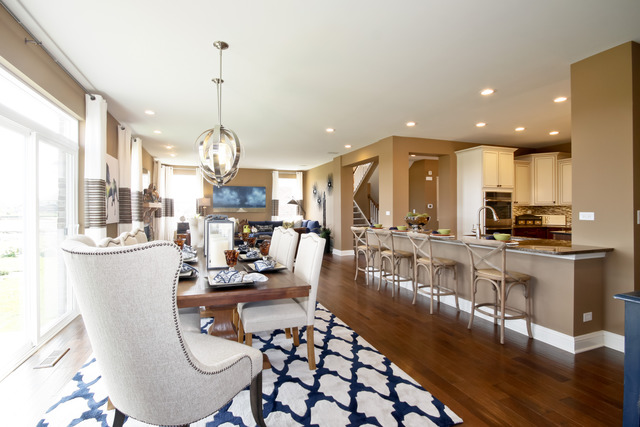 2056 Stapleton Road New Lenox, IL 60451 - Photo 4 of 25 a view of a kitchen and dining area with chandelier