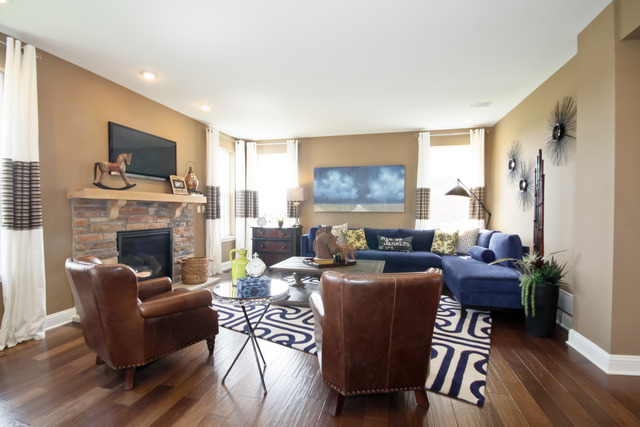 2056 Stapleton Road New Lenox, IL 60451 - Photo 5 of 25 a living room with furniture a flat screen tv and a fireplace