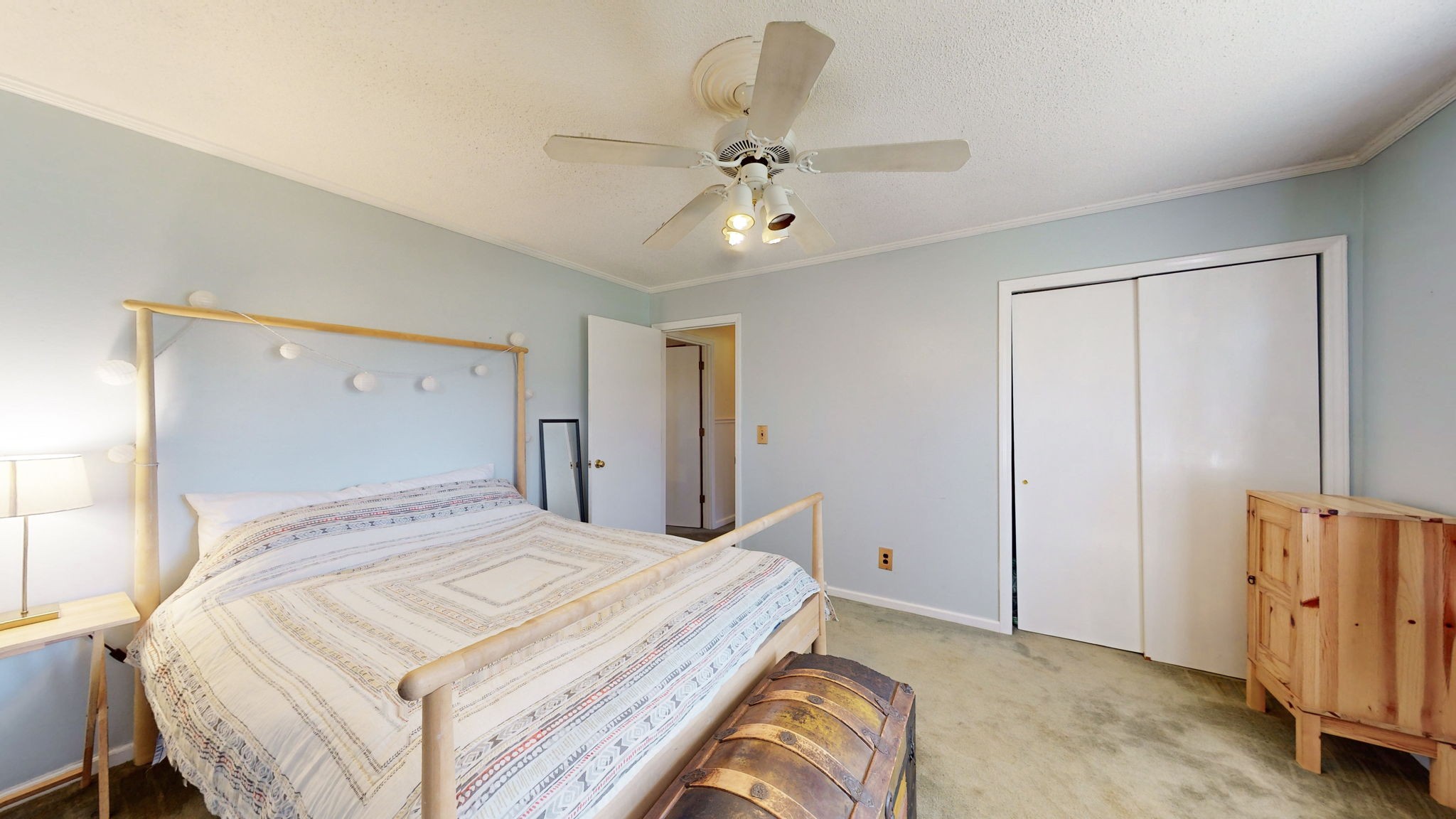 1510 Avon Road Murfreesboro, TN 37129 - Photo 22 of 35 a bedroom with a bed and a chandelier
